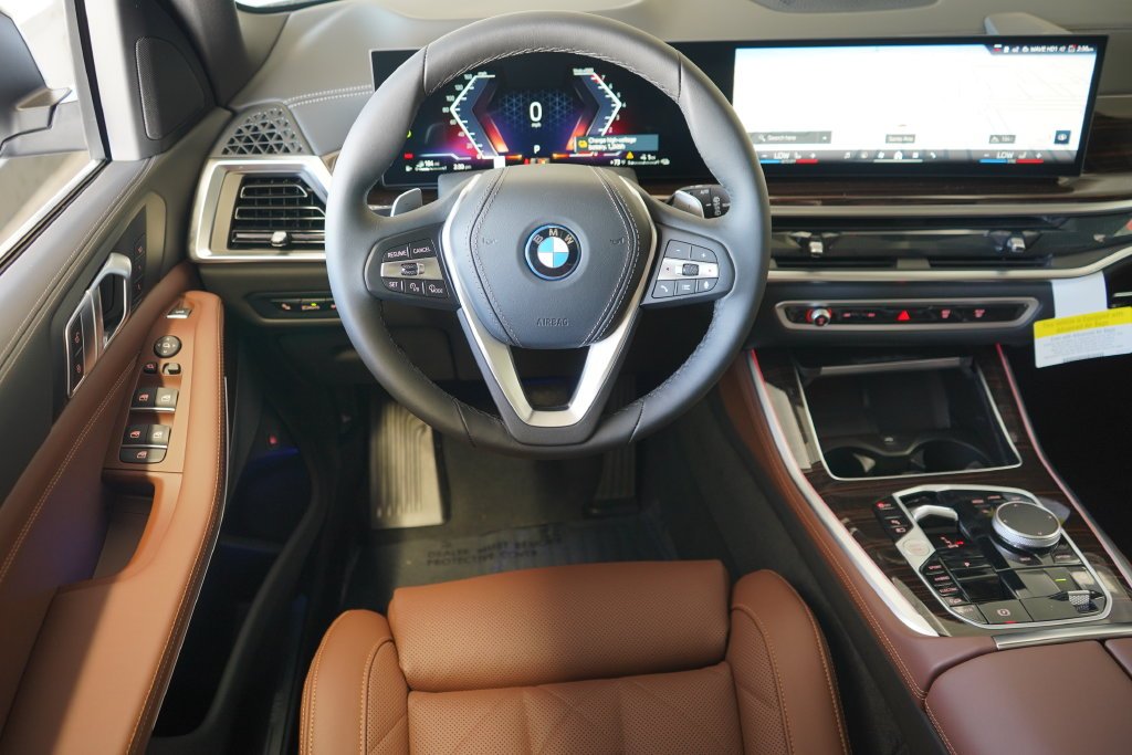Used 2026 Black Sapphire Metallic BMW xDrive50e image 16