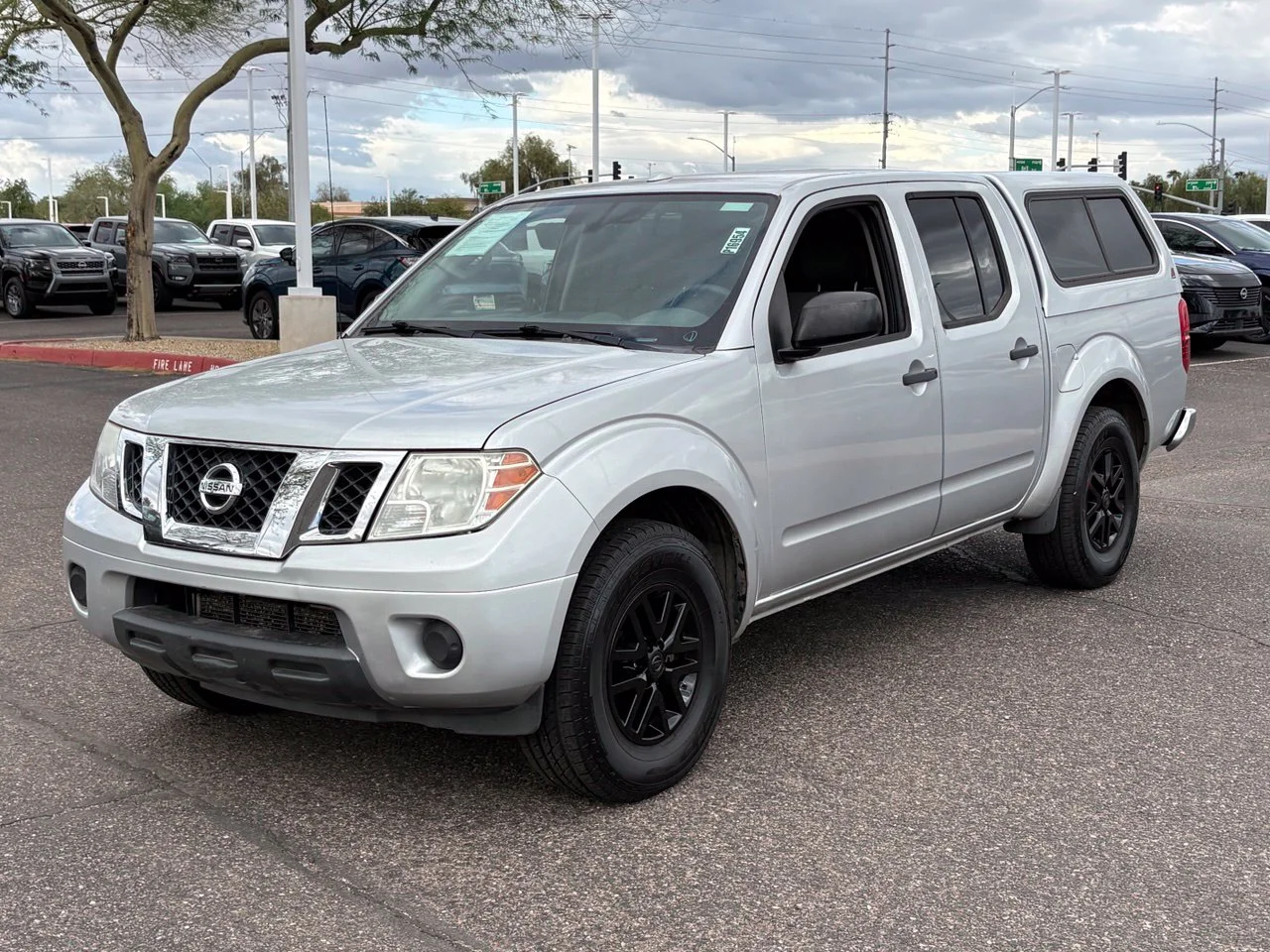 Used 2018 Brilliant Silver Nissan SV image 1