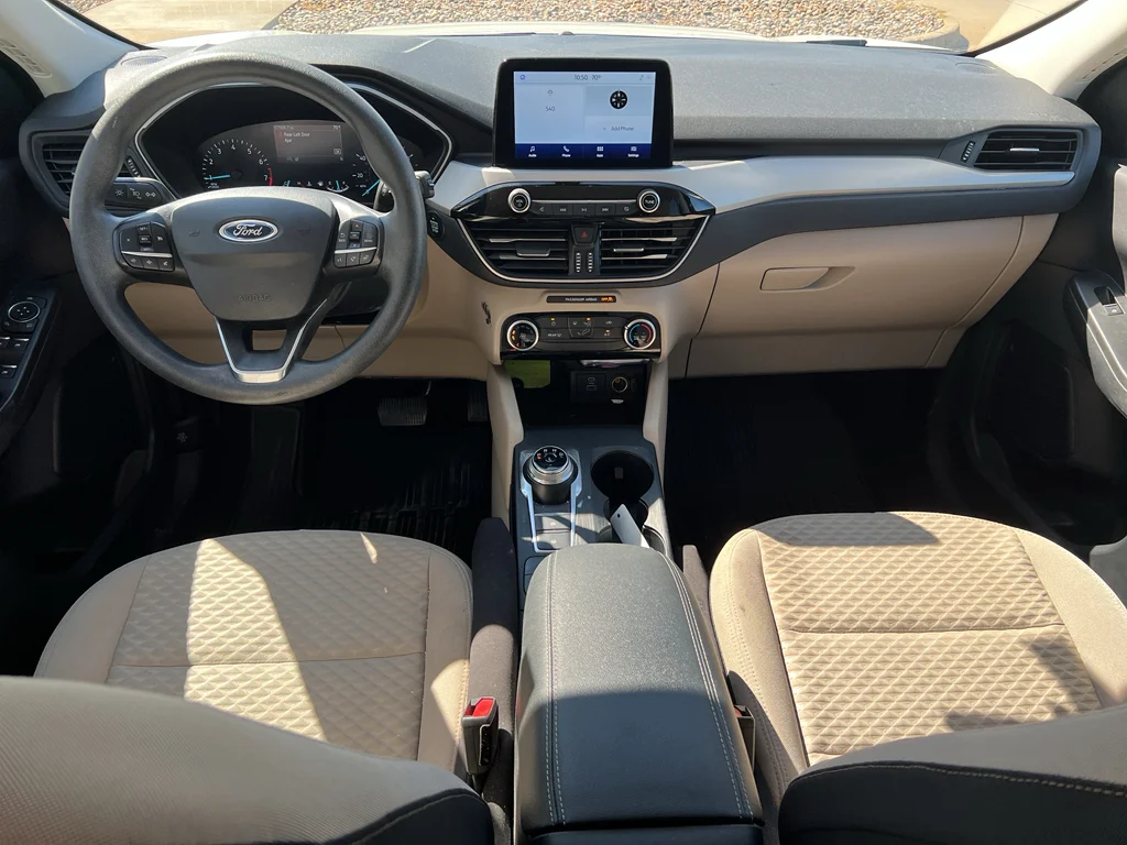Used 2021 Ford Escape SE with VIN 1FMCU9G67MUA01253 for sale in Pella, IA