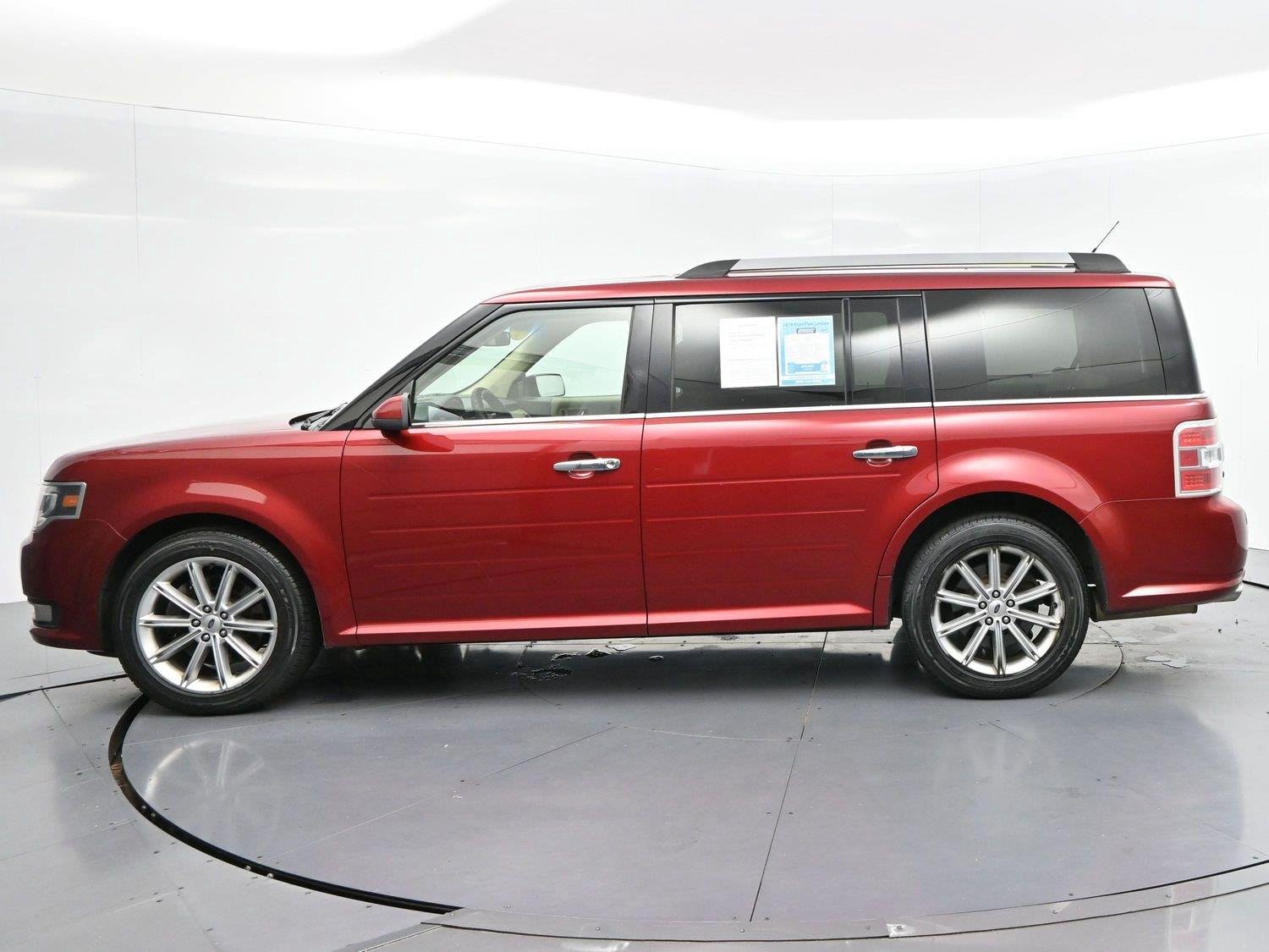 Used 2014 Ruby Red Metallic Tinted Clearcoat Ford Limited image 4