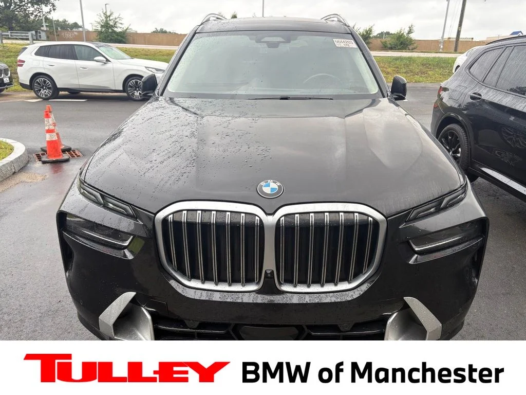 Certified Used 2023 Black Sapphire Metallic BMW xDrive40i image 1