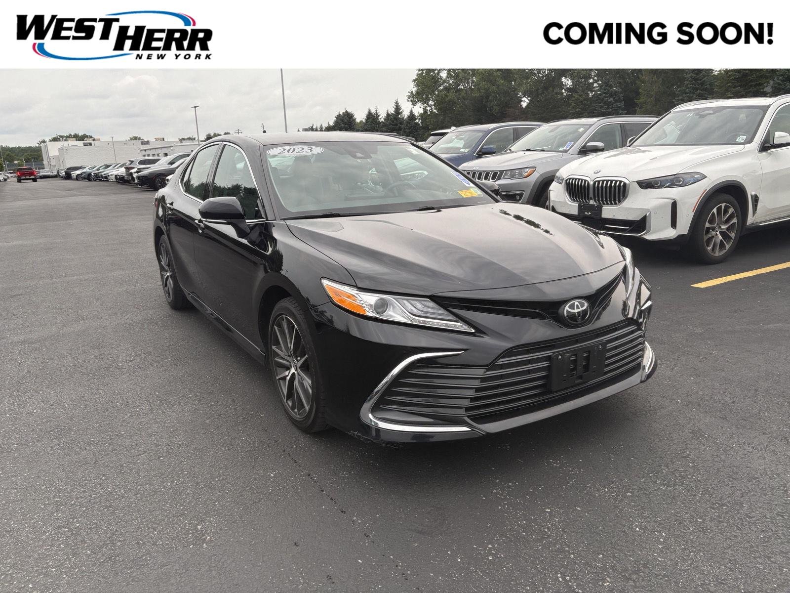 Used 2023 Midnight Black Metallic Toyota XLE image 1