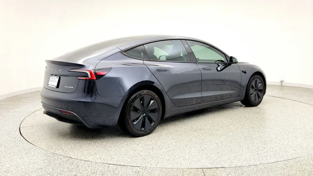 Used 2025 Stealth Grey Tesla Long Range AWD image 5