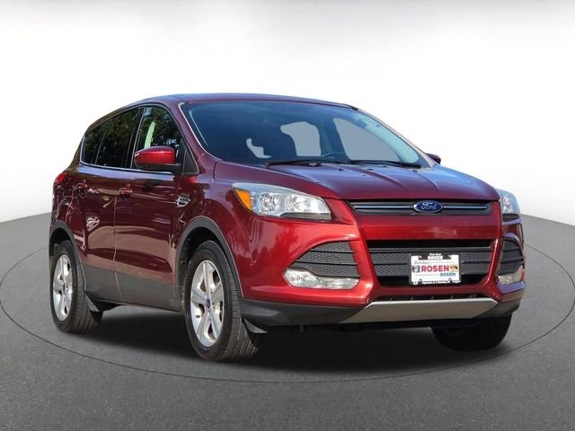 Used 2016 Orange Ford SE image 1