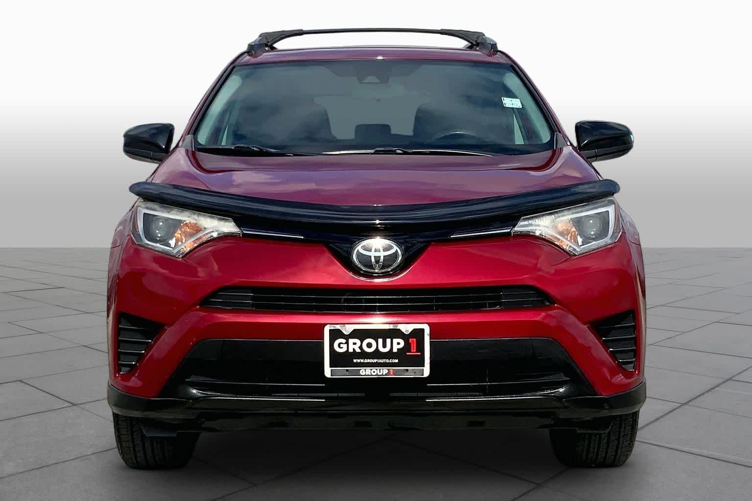 Used 2018 Ruby Flare Pearl Toyota LE image 4