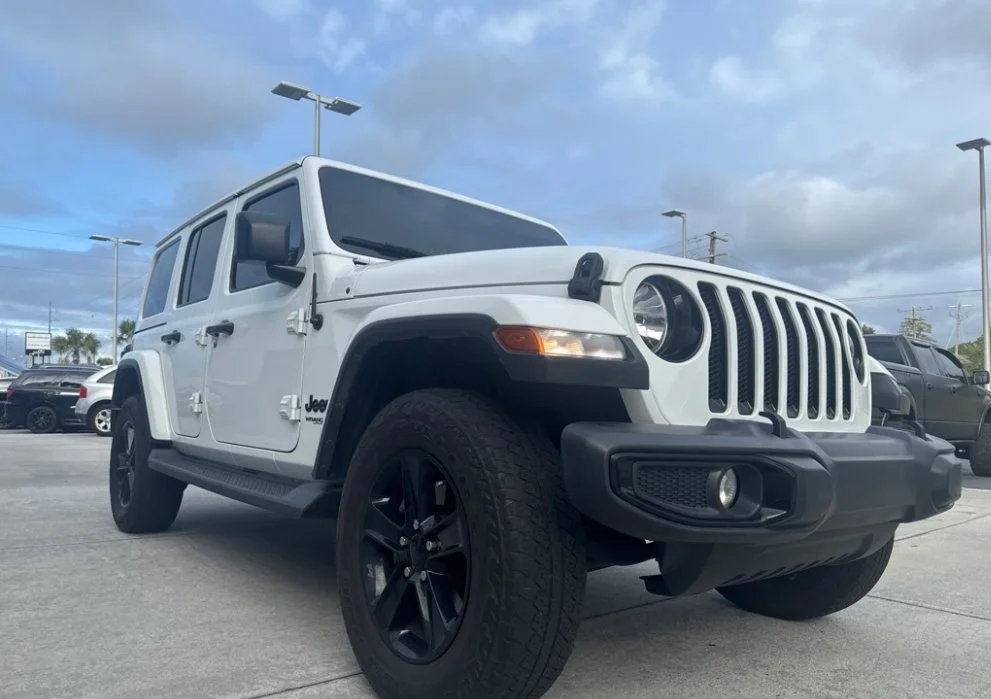 Used 2021 White Jeep Unlimited Sahara Altitude image 1