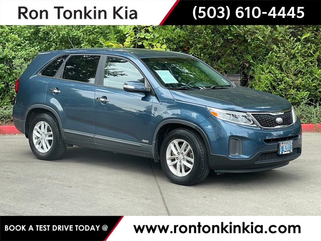 Used 2014 Wave Blue Kia LX image 1