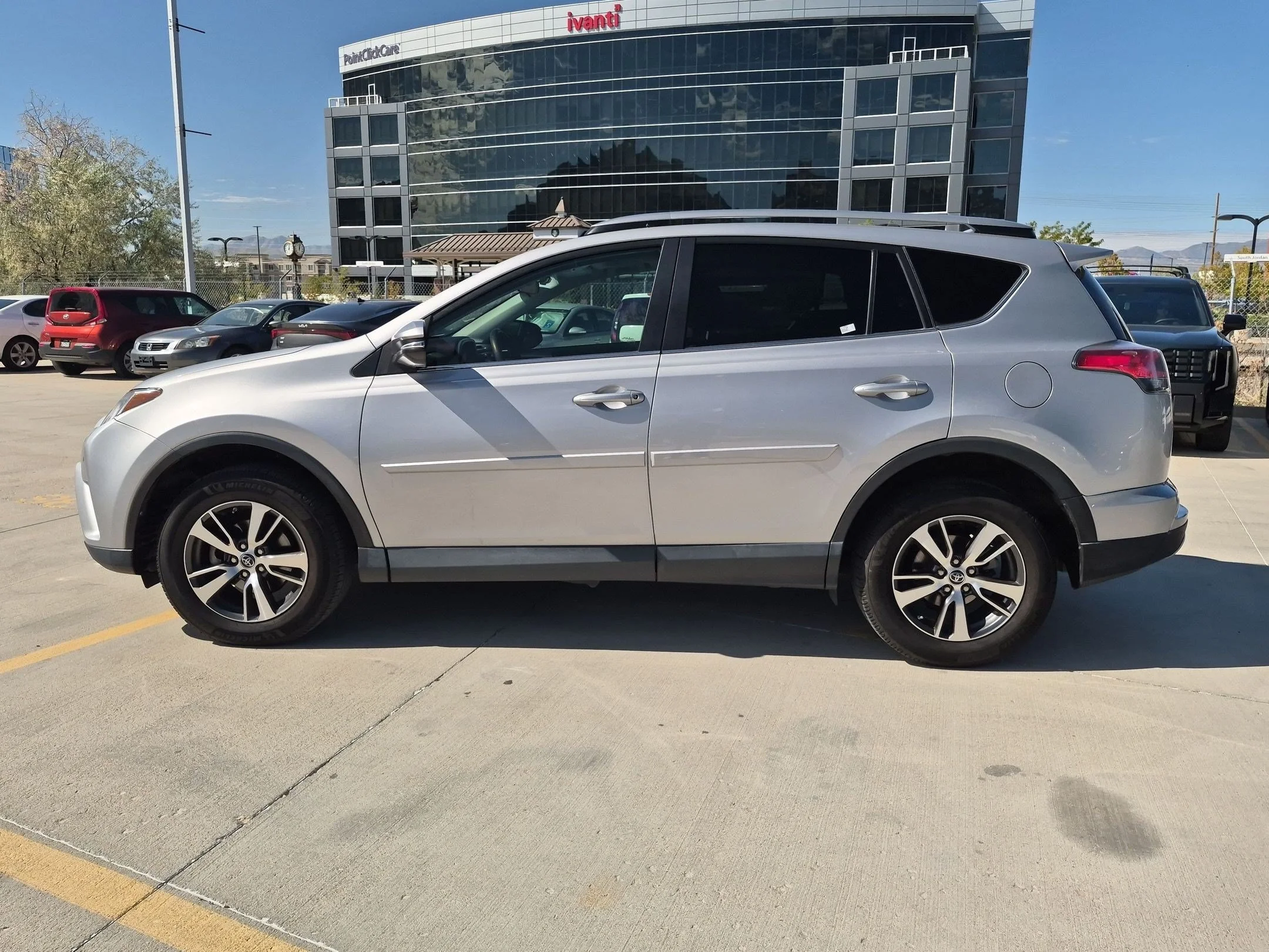 Used 2018 Silver Sky Metallic Toyota XLE image 2