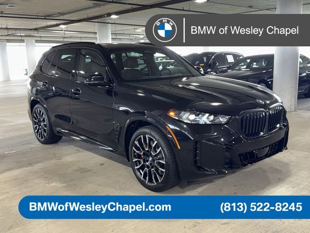 New 2026 Black Sapphire Metallic BMW xDrive50e image 1