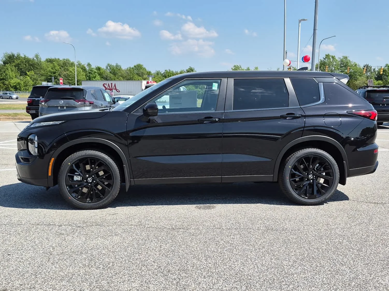 New 2026 Cosmic Black Nissan SL image 5