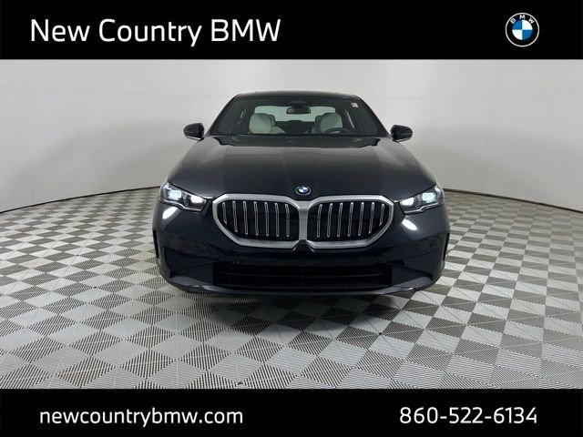 New 2027 Black Sapphire Metallic BMW 550e xDrive image 2