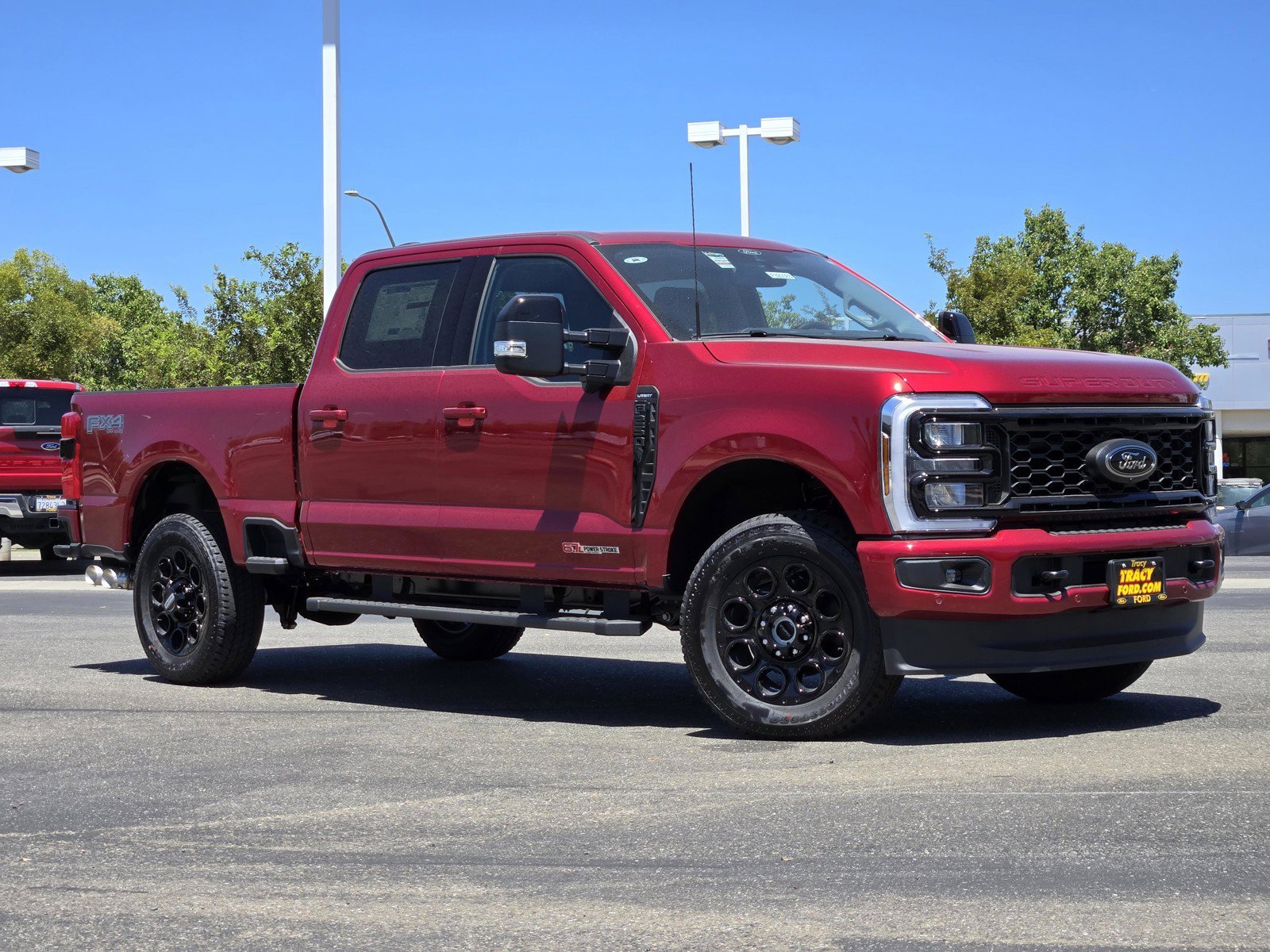 New 2026 Ruby Red Metallic Tinted Clearcoat Ford F-250® Lariat® image 1