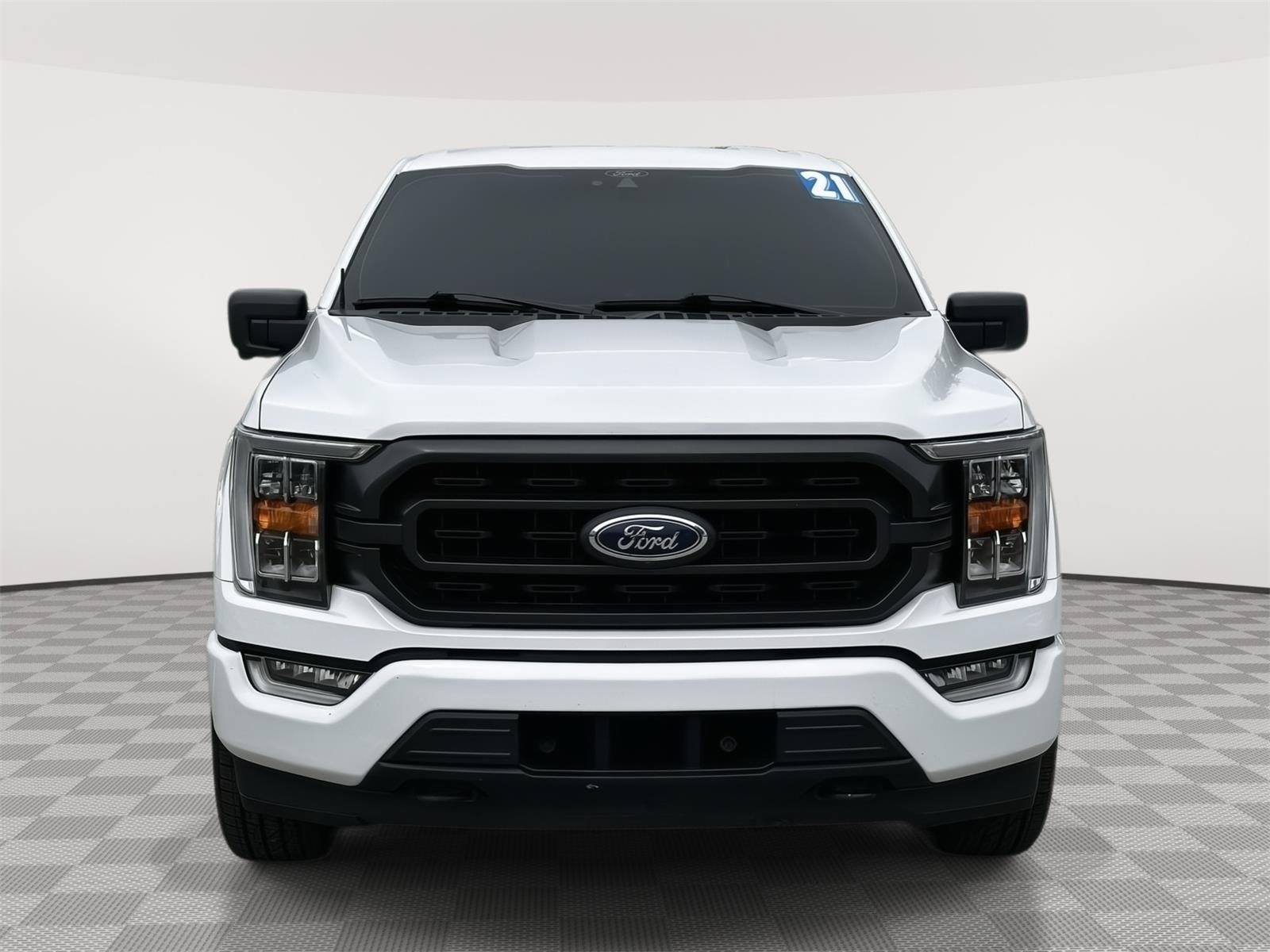 Used 2021 Ford F-150 XLT with VIN 1FTFW1E5XMFC31106 for sale in Kansas City