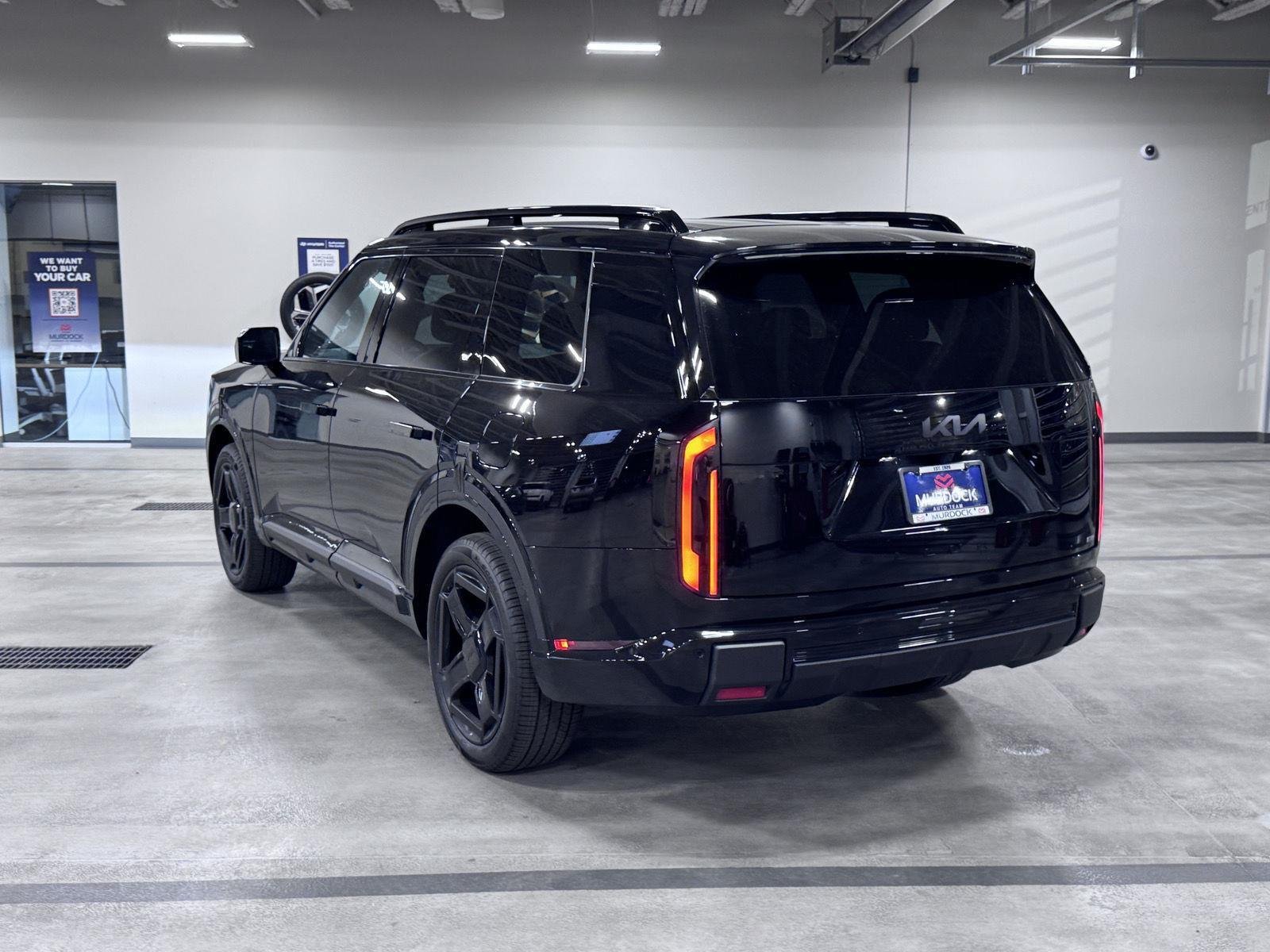 Used 2027 Ebony Black Kia X-Line EX image 6