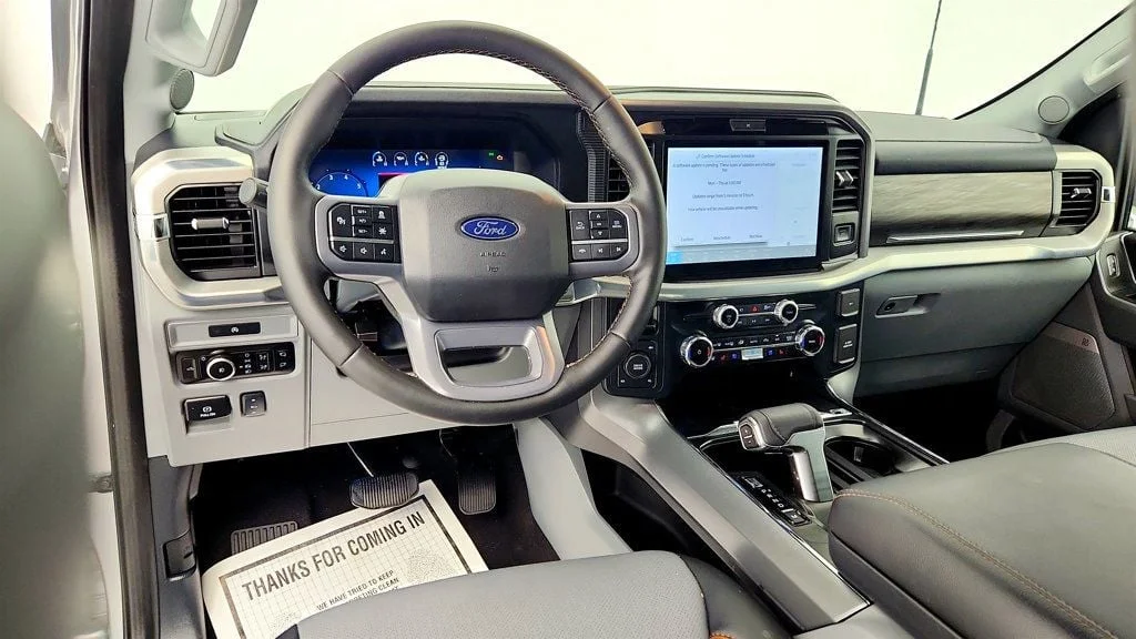 Used 2025 Iconic Silver Metallic Ford LARIAT 4WD SuperCrew 6.5