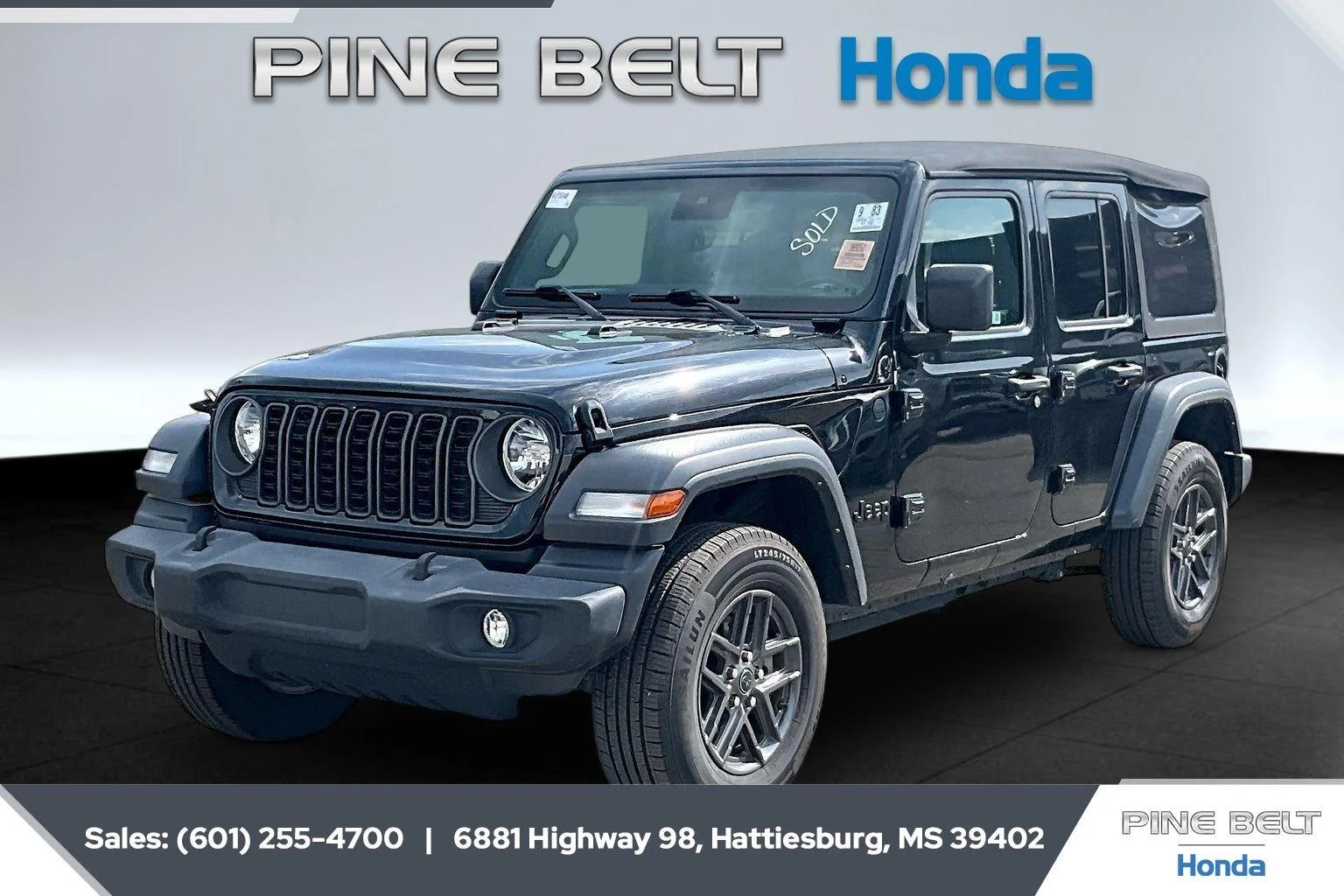 Used 2024 Black Clearcoat Jeep Sport S image 1