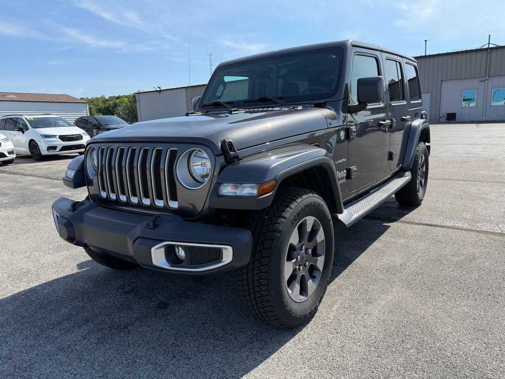 Used 2019 Granite Crystal Metallic Clearcoat Jeep Sahara image 1