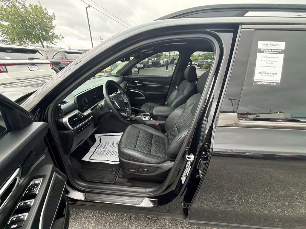 Used 2024 Black Kia EX X-Line image 11