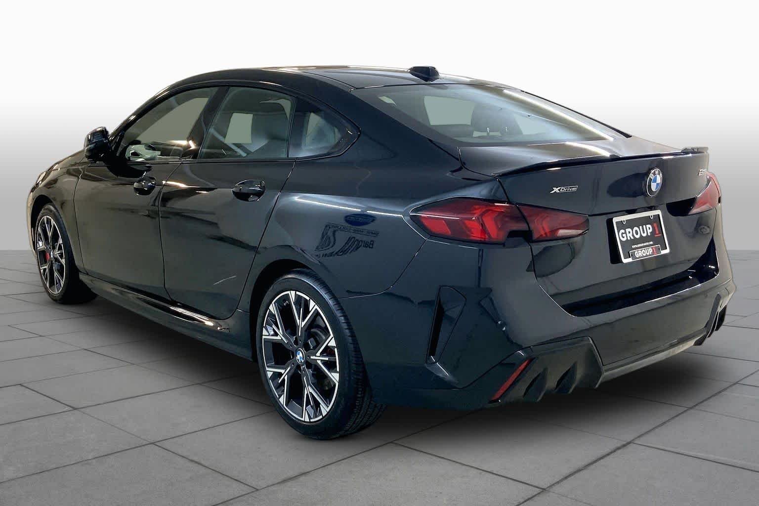 Used 2025 Black Sapphire Metallic BMW 228 xDrive image 11
