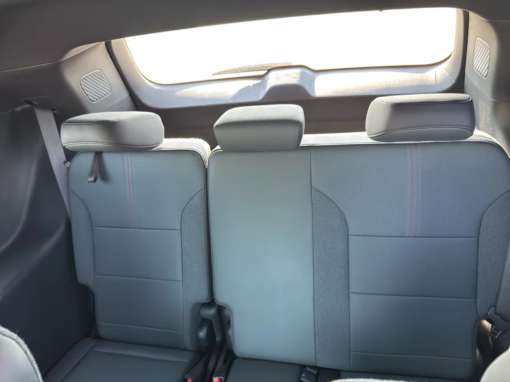 Used 2024 Ebony Twilight Metallic GMC AWD AT4 image 11