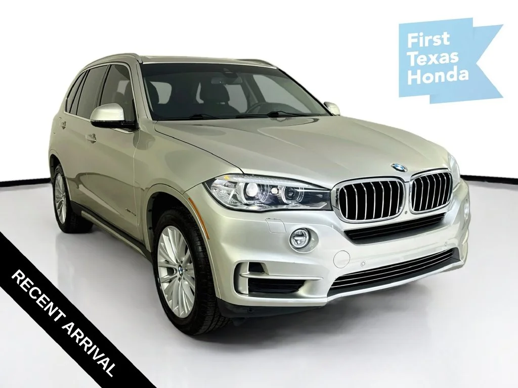 Used 2016 Mineral Silver Metallic BMW xDrive40e image 1