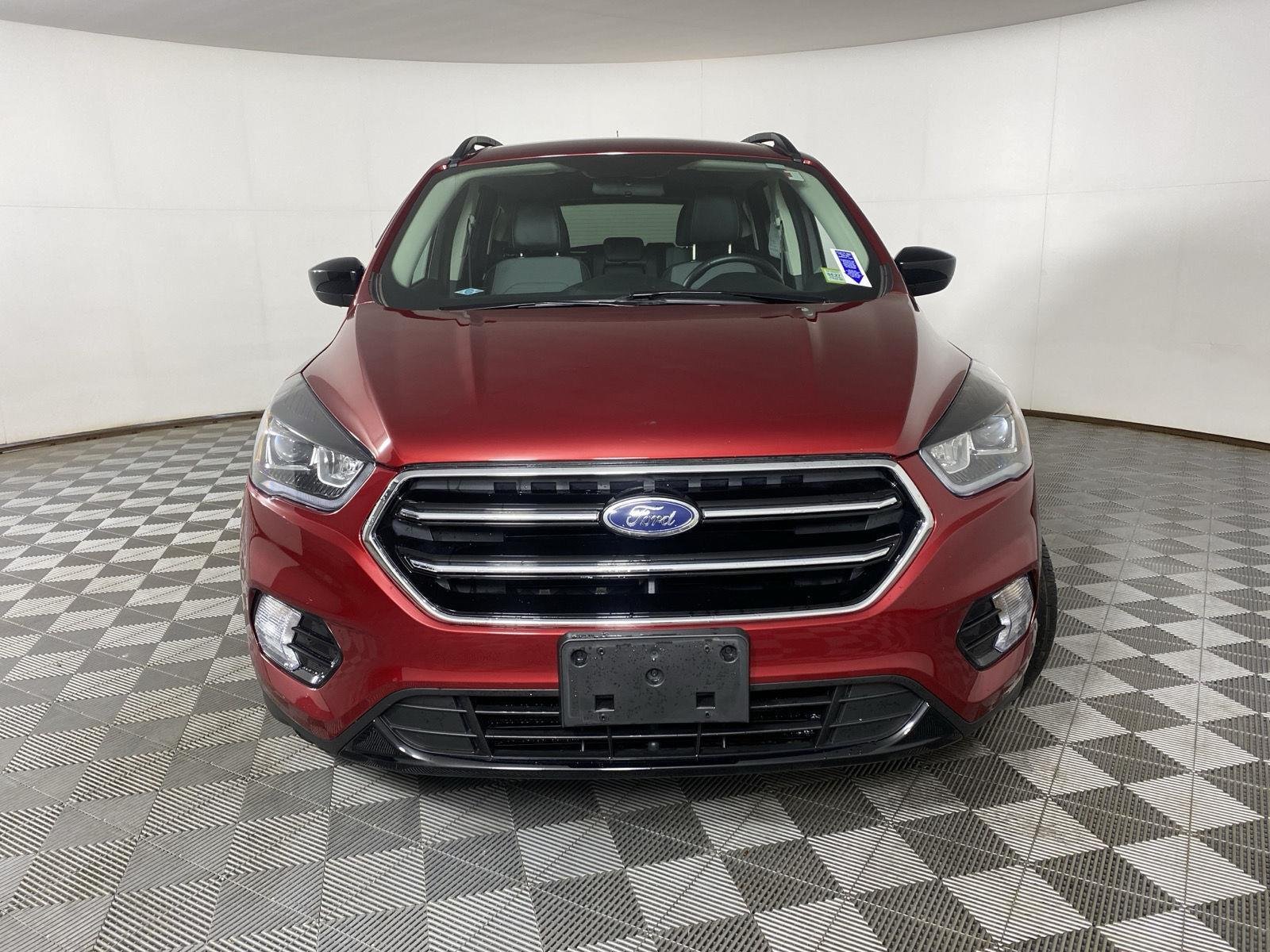 Used 2017 Ruby Red Metallic Tinted Clearcoat Ford SE image 2