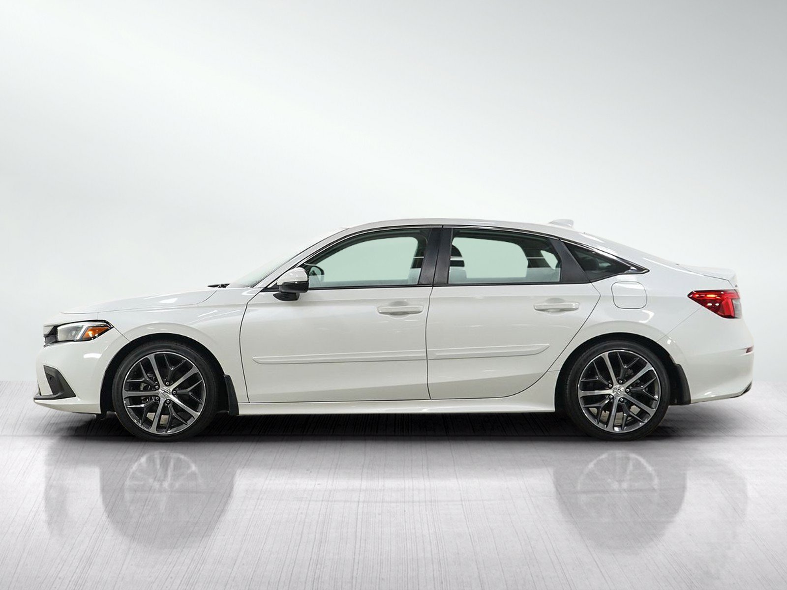 Used 2023 Honda Civic Touring with VIN 2HGFE1F90PH308056 for sale in Burnsville, Minnesota