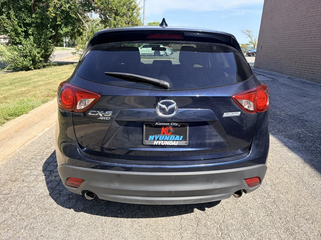 Used 2015 Deep Crystal Blue Mica Mazda Touring image 4
