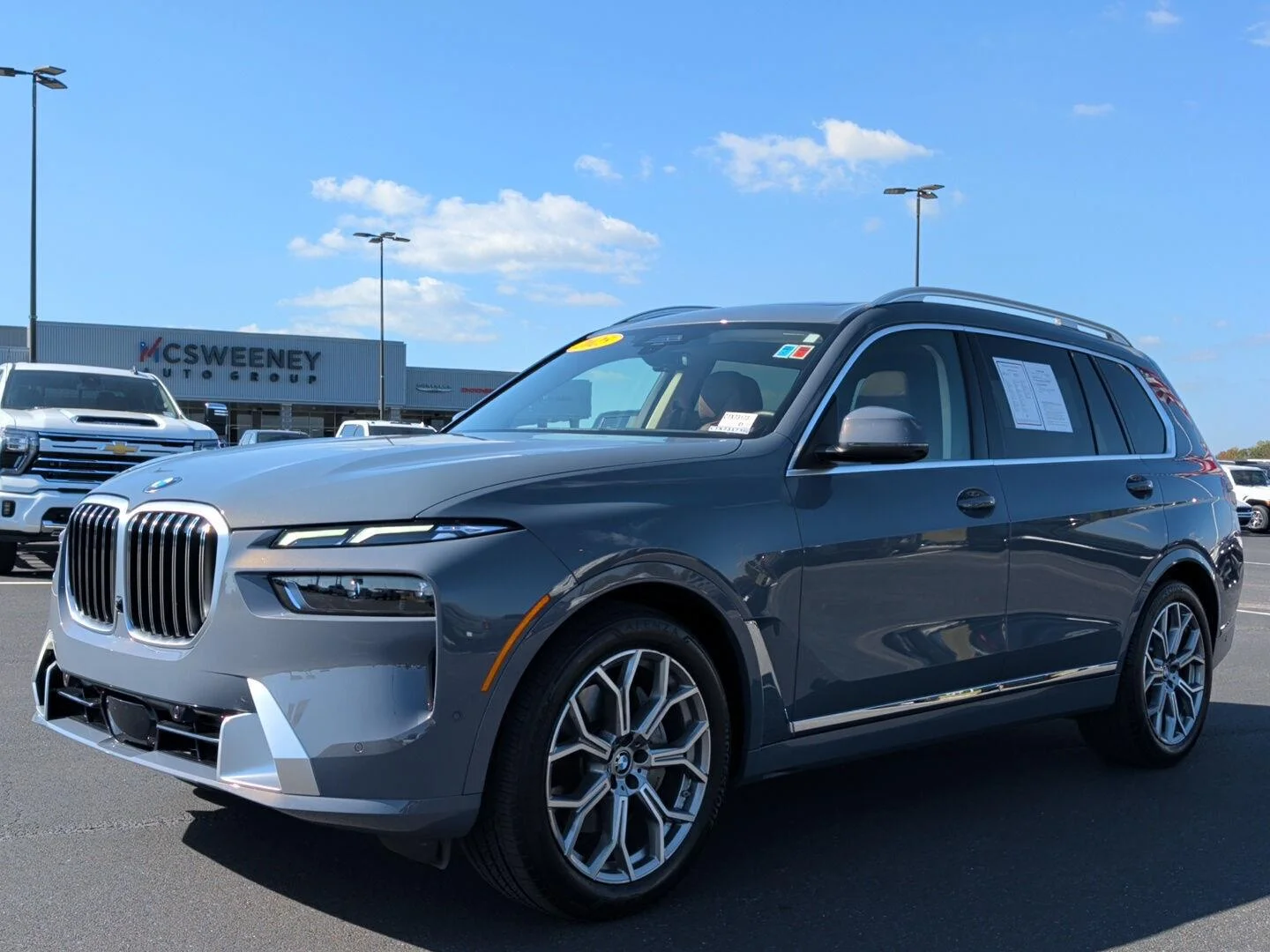 Used 2025 Sparkling Copper Metallic BMW xDrive40i image 1