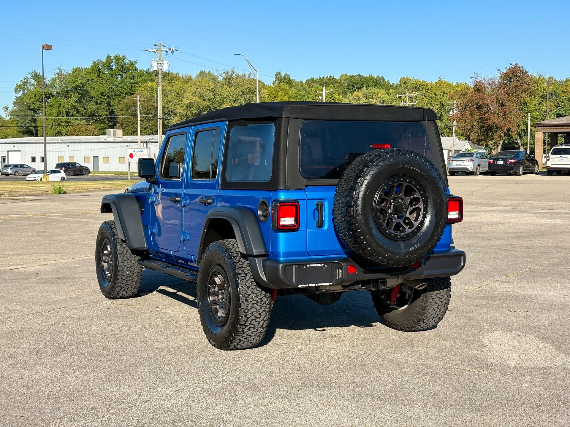 Used 2023 Blue Jeep Sport image 9