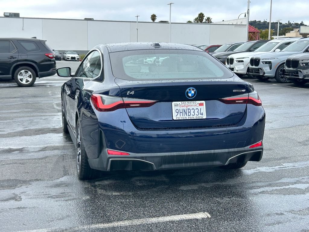 Certified Used 2023 Tanzanite Blue II Metallic BMW eDrive40 image 3