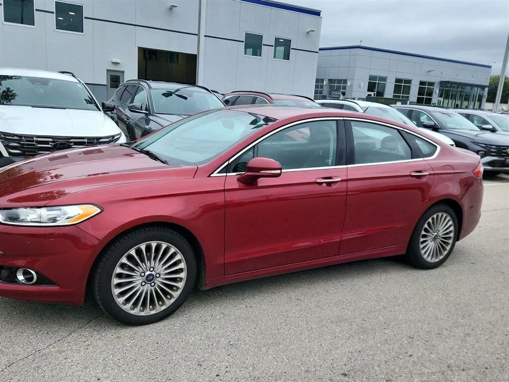 Used 2016 Ruby Red Metallic Tinted Clearcoat Ford Titanium image 8
