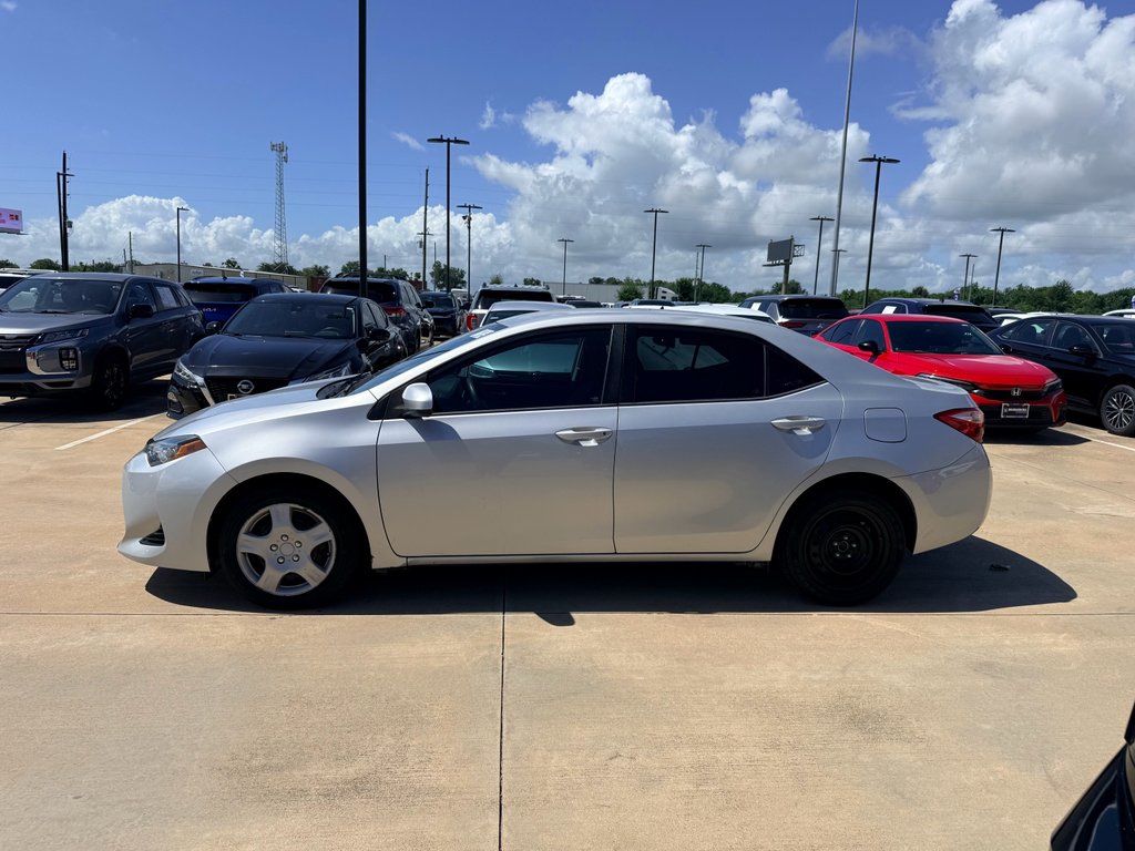 Used 2018 Classic Silver Metallic Toyota LE image 8