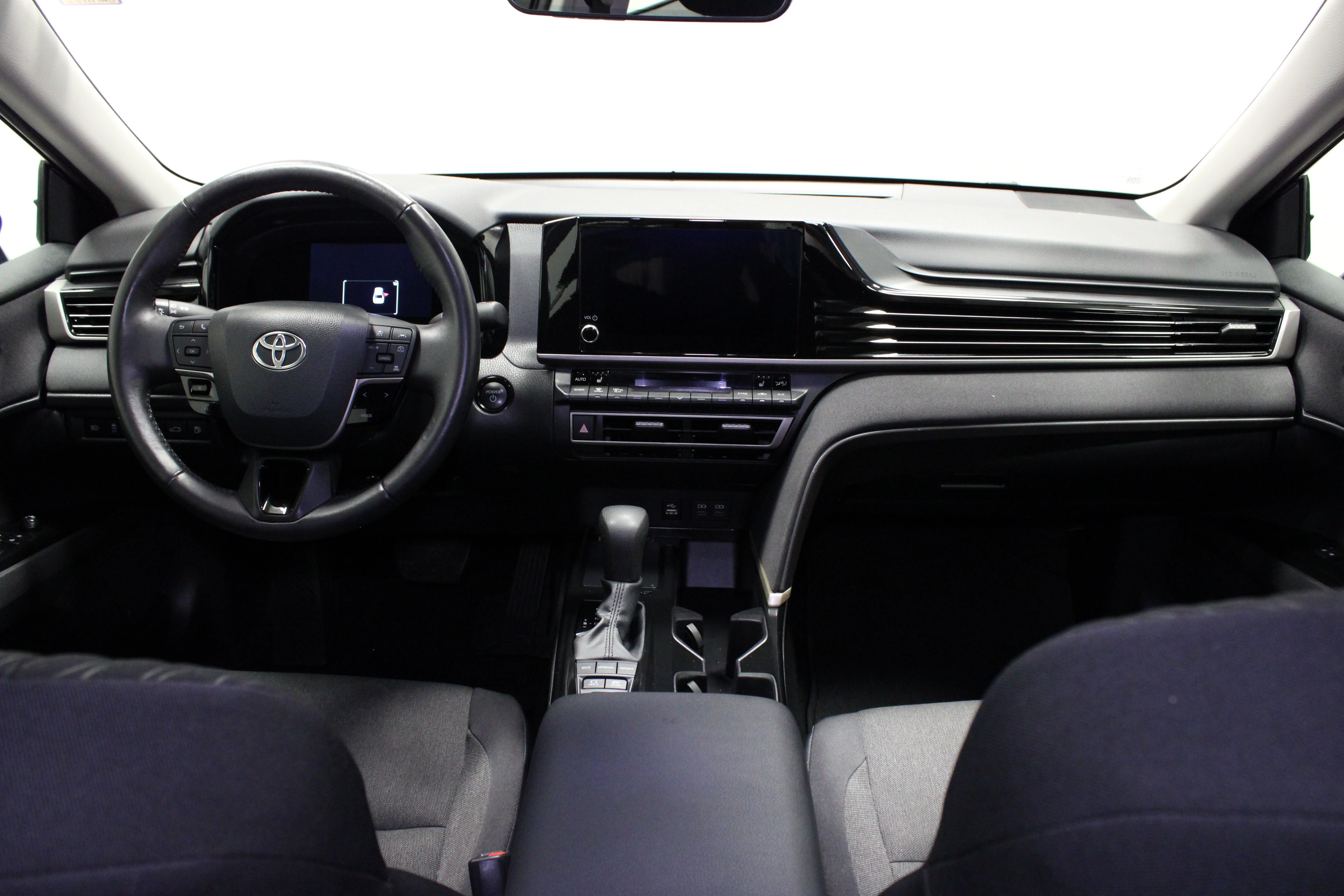 Used 2025 Midnight Black Metallic Toyota LE image 19