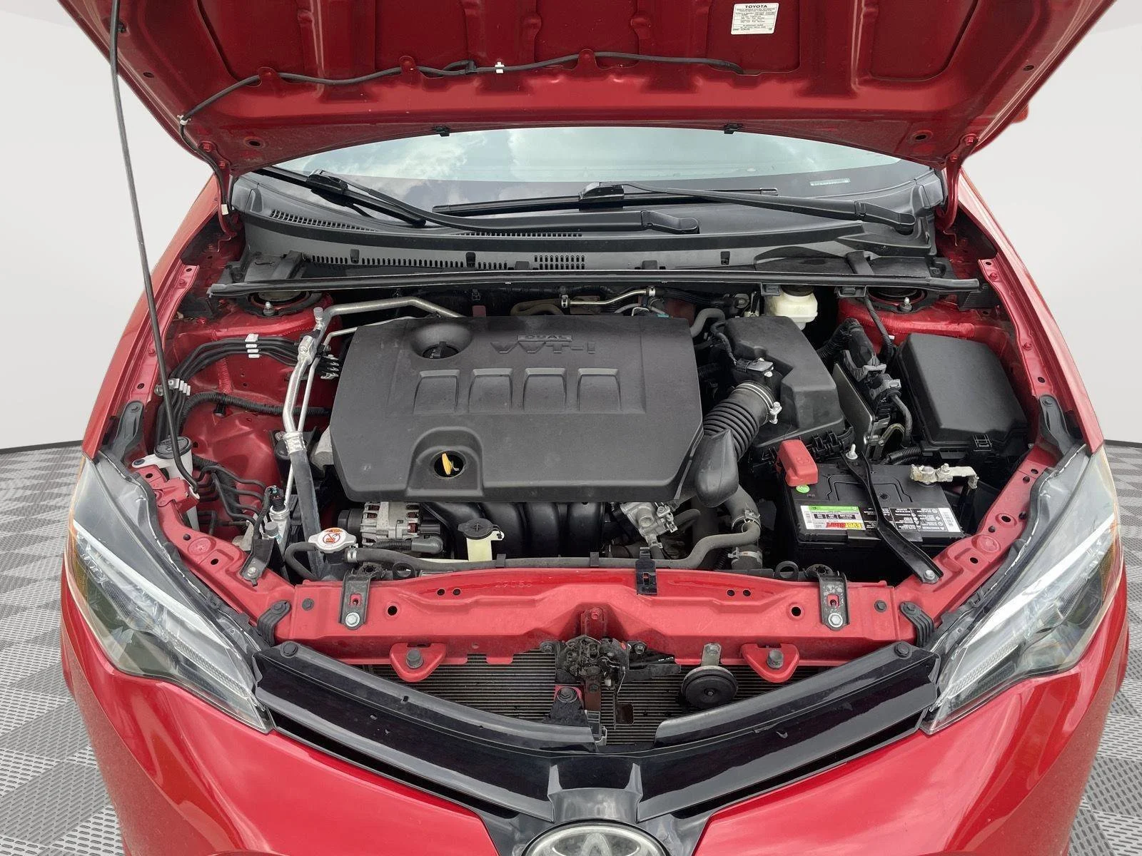 Used 2018 Barcelona Red Metallic Toyota LE image 13