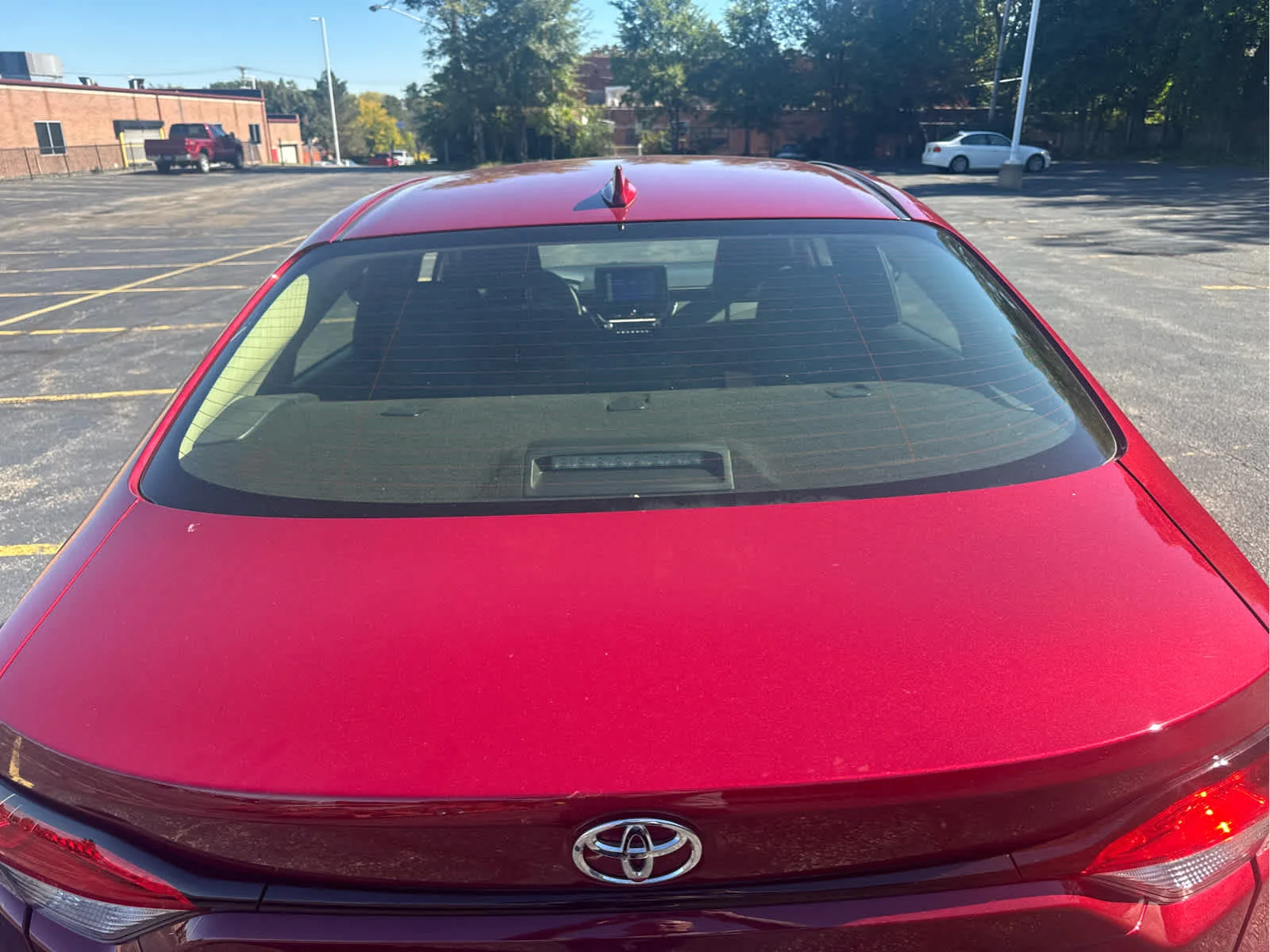 Used 2024 Ruby Flare Pearl Toyota LE image 17