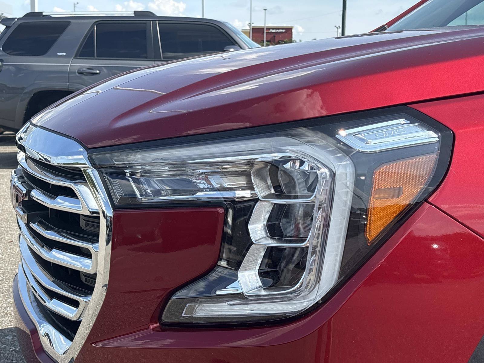 Used 2024 Volcanic Red Tintcoat GMC SLT image 9