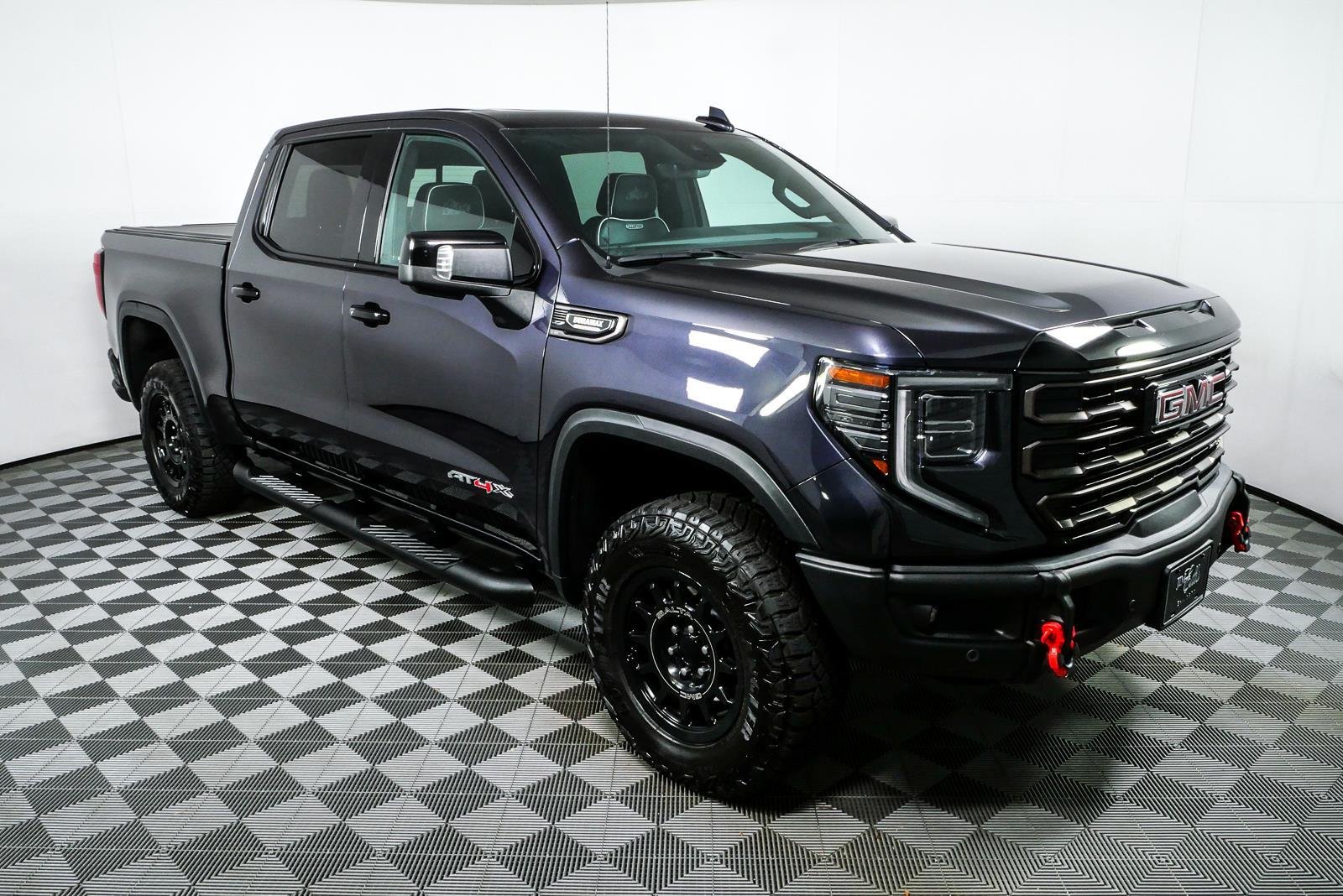 Used 2024 Titanium Rush Metallic GMC AT4X image 1