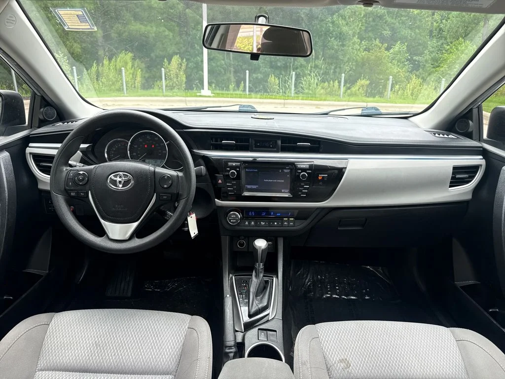 Used 2016 Classic Silver Metallic Toyota LE image 16