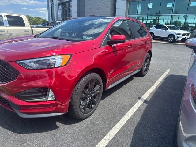 Used 2024 Rapid Red Metallic Tinted Clearcoat Ford ST Line image 1