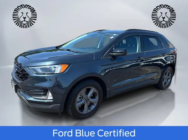 Used 2024 Blue Metallic Ford SEL image 1