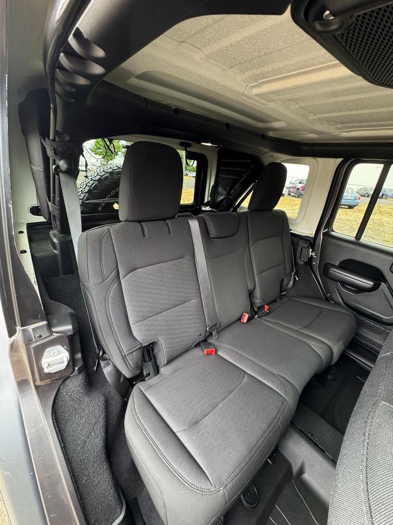 Used 2018 Granite Crystal Metallic Clearcoat Jeep Unlimited Sport S image 21