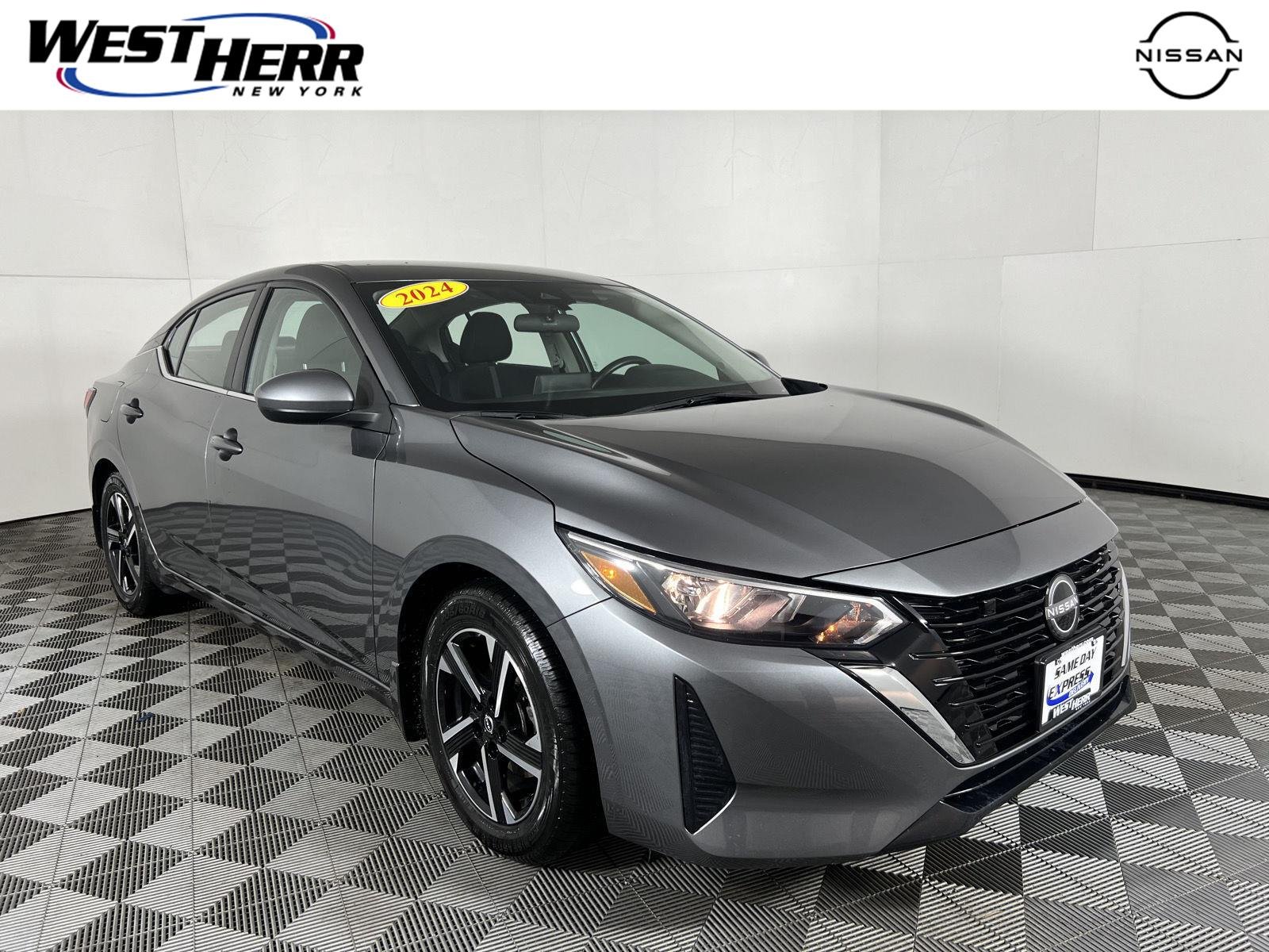 Used 2024 Gun Metallic Nissan SV image 1