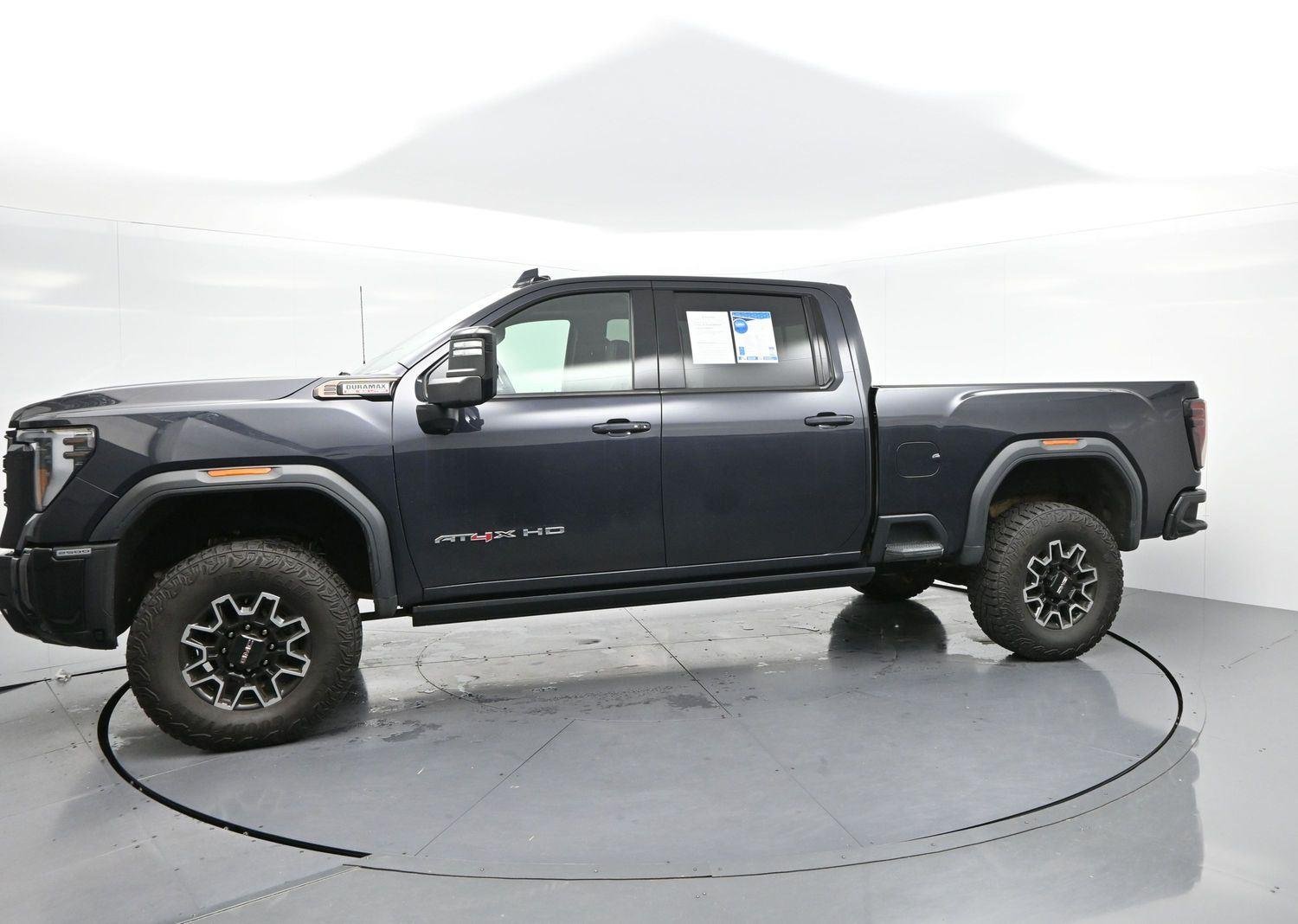 Used 2024 Titanium Rush Metallic GMC AT4X image 4