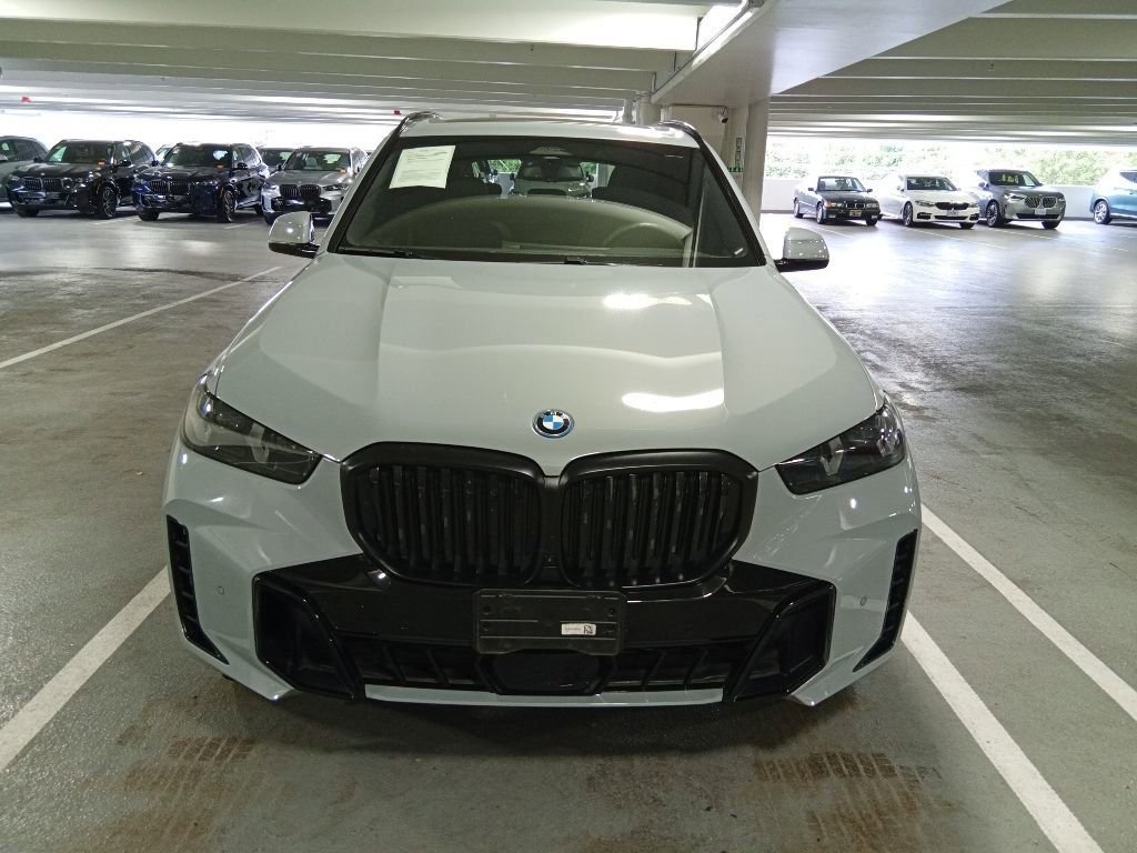 Used 2024 Brooklyn Grey Metallic BMW xDrive50e image 2