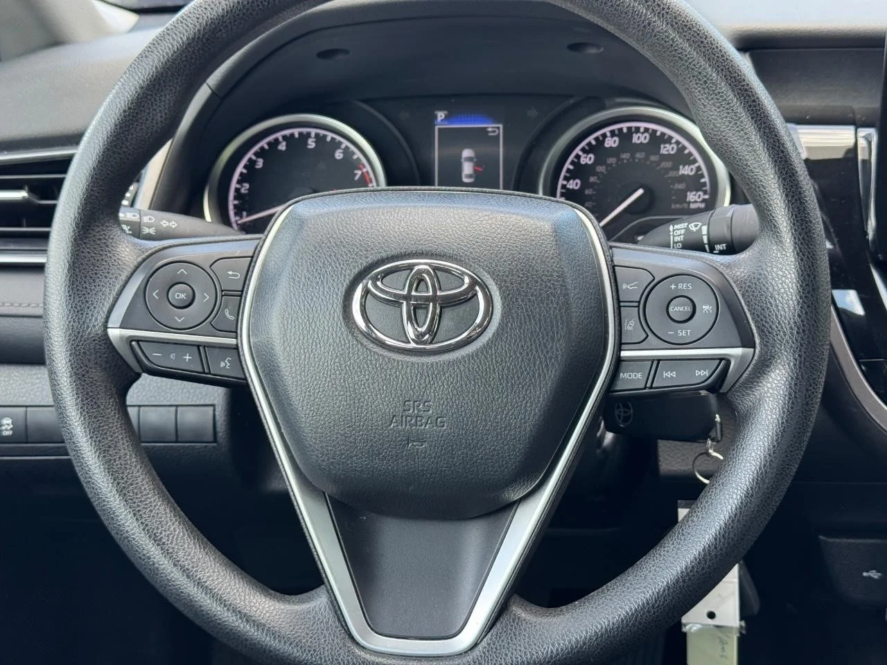 Used 2024 Reservoir Blue Toyota LE image 13
