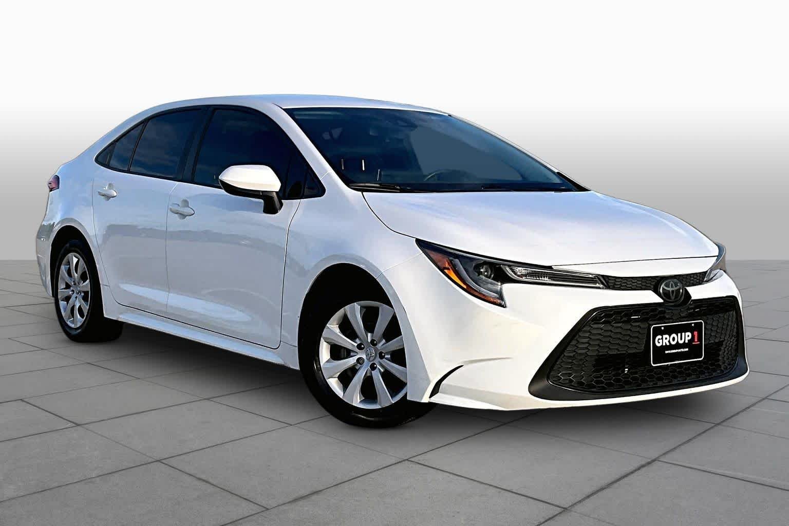 Used 2021 Super White Toyota LE image 3