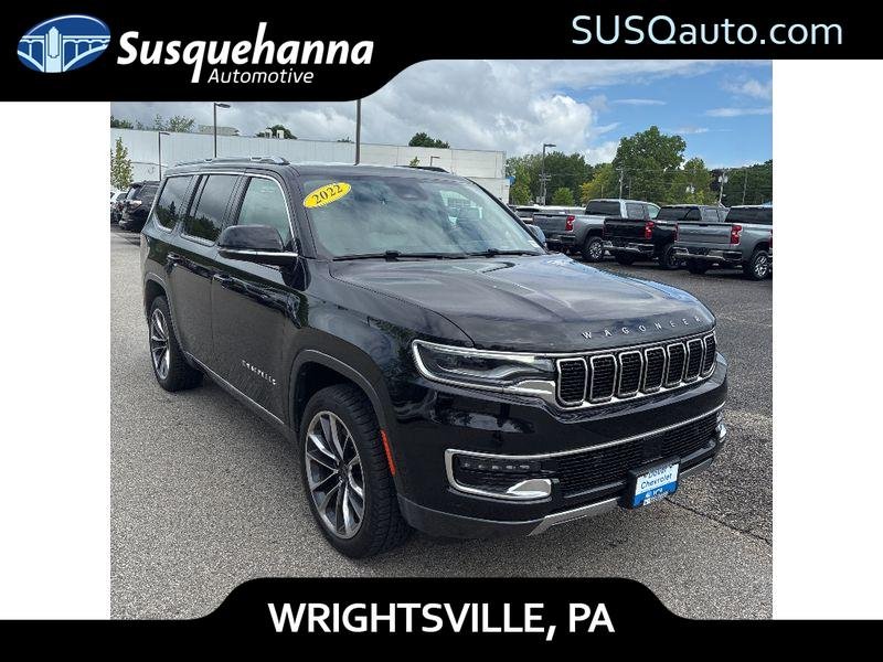Used 2022 Diamond Black Crystal Pearlcoat Jeep Series III image 1