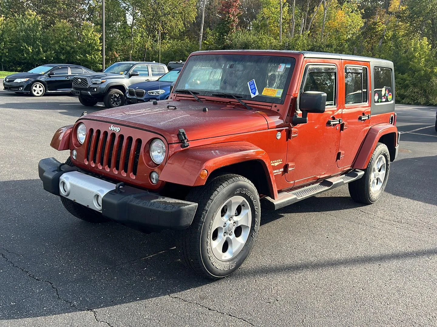 Used 2014 Copperhead Pearlcoat Jeep Sahara image 2