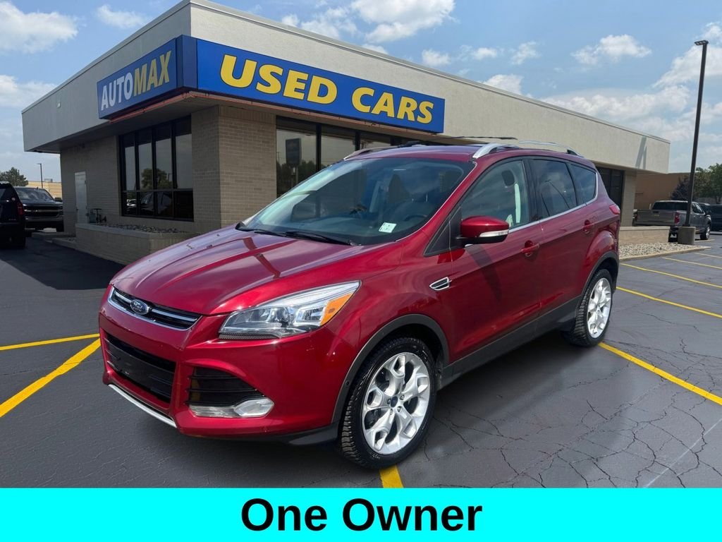 Used 2014 Ruby Red Ford Titanium image 1